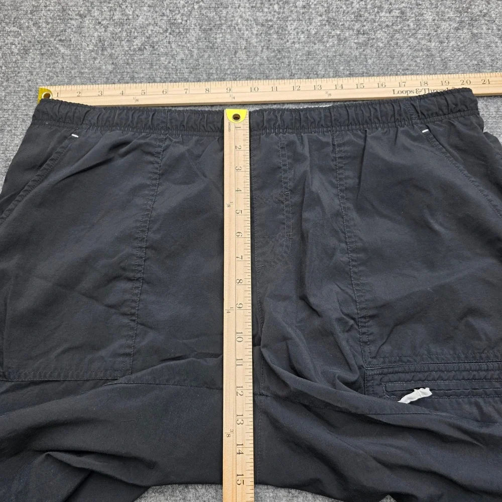 Nike Men's‎ Swim Trunks Shorts Size XL Black Cargo Pocket Mesh Lined Blue Swoosh